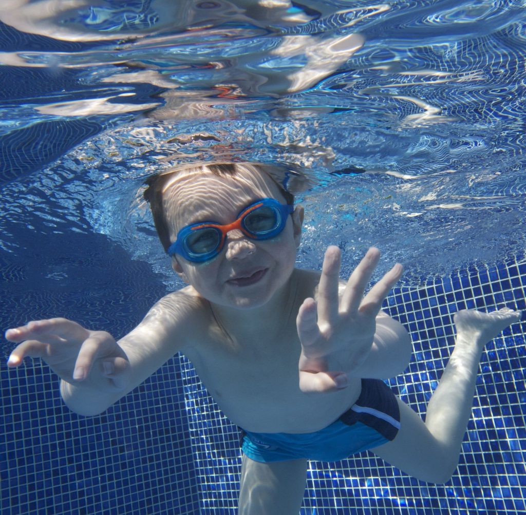 Child Swimming At Lower Mill Estate Pool vert Child Swimming At Lower Mill Estate Pool vert